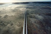 France,between Calvados and Seine Maritime,the Pont de Normandie (Normandy Bridge) at dawn,south access viaduct and Rivière-Saint-Sauveur viewed from the South Pylon
