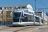 France,Meurthe et Moselle,Nancy,tramway and apartment buildings on XXeme Corps avenue