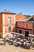 France,Vaucluse,regional natural park of Luberon,Roussillon,labeled the most beautiful villages of France,town hall square