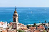 France,Alpes-Maritimes,Menton,bell tower of the Immaculate Conception chapel,or White Penitents and the Bay of the Soleil