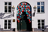 Denmark,Decorative coloured birdhouses in facade,Copenhagen