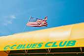 USA,Tennessee,US Flag on top of CC Blues Club,Memphis
