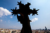 Spain,Backlit statue in front of cityscape,Barcelona