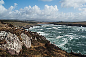 UK,Ireland,County Kerry,Ring of Skelligs,Ballinskelligs,Waves crashing against Bolus Head