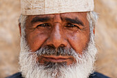 Portrait Of Bearded Man In Traditional Cap,Al Ain,Abu Dhabi,United Arab Emirates