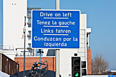 Signposts With Information In Several Languages,Poole,Dorset,England,United Kingdom