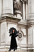 Woman Standing Outside Santa Maria Della Salute,Venice,Italy