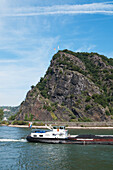 A Barge Sails Down Rhine River By Loreley Rock,Germany