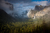 Sunlight illuminates Bridalveil Fall in Yosemite National Park,California,USA,California,United States of America