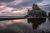Rock formation forming an island close to the shore along the Pacific Coast at Ruby Beach during sunset in the Olympic National Park near Kalaloch,Kalaloch,Olympic National Park,Washington,United States of America