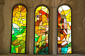 Stained glass arched windows in the Sagrada Familia Cathedral,Barcelona,Spain
