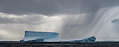 Large iceberg and stormy weather,Antarctica
