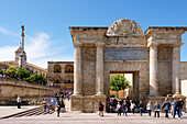 North end of Roman Bridge with gate to city entrance,triumphal arch,Cordoba,Andalucia,Spain