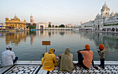 Sikhs by the Golden Temple (Sri Harmandir Sahib) Gurdwara and Sarovar (Pool of Nectar),Amritsar,Punjab,India