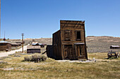 Several abandoned homes and shops along a dirt road in Bodie Ghost Town.,Bodie State Historic Park,Bridgeport,California