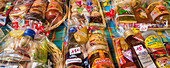 Packages of traditional foods for sale at a street market in Grande-Terre,Guadeloupe,French West Indies,Grande-Terre,Guadeloupe,France