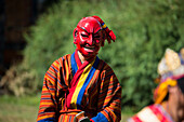 Maskierter Teilnehmer am Tanz- und Musikfestival, Paro-Tal, Bhutan