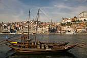 Boats docked alongside the Douro River in Porto,Porto,Portugal