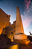 Obelisk and sphinx head at the entrance to Luxor Temple,Luxor,Egypt