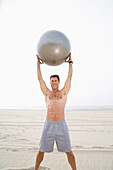 Man Holding Exercise Ball