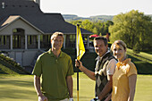 Porträt von Golfspielern auf dem Grün