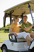 Couple in Golf Cart