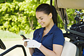 Woman in Golf Cart