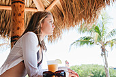 Woman in Tiki Hut,Florida,USA