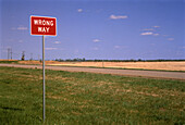 Wrong Way Sign near Road