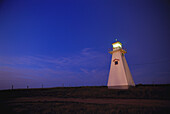 Cape Tryon Lighthouse and Field At Sunrise,Cape Tryon,Prince Edward Island,Canada