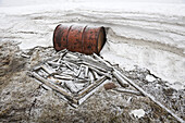 Fuel Barrel and Scrap Wood by an Abandoned RCMP Post and Post Office