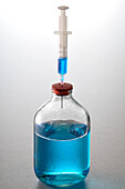 Needle in Jar of Blue Liquid