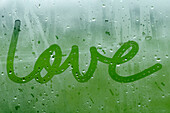 Love Written on Foggy Window