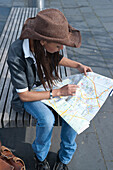 Woman Looking at Map,Mannheim,Baden-Wurttemberg,Germany