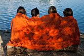 Children Sitting by Lake