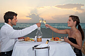 Couple Dining on Beach,Reef Playacar Resort and Spa,Playa del Carmen,Mexico