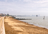 View towards Dovercourt High and Low Lighthouses (Dovercourt Range Lights),built in 1863 to work as leading lights,guiding vessels around Landguard Point,and discontinued in 1917,Harwich,Essex,England,United Kingdom,Europe