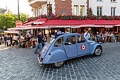 Street scene with blue Citroen 2CV car and cafe restaurant,Montmartre,Paris,France,Europe