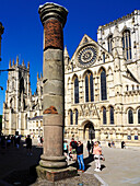 Roman Column and York Minster in Minster Yard,York,Yorkshire,England,United Kingdom,Europe