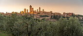 View of San Gimignano skyline at sunset,San Gimignano,Province of Siena,Tuscany,Italy,Europe