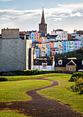 Colorful rooftops and church spire in the seaside village of Tenby on the Pembrokeshire Coast,Wales,United Kingdom,Europe