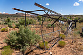 The derrick of an old collapsed Aeromotor-styel windpump or windmill on a former cattle ranch in southeastern Utah.