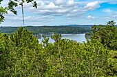 View of Lake Yaxha from the top Structure 117 in the Mayan ruins in Yaxha-Nakun-Naranjo National Park,Guatemala. This tall unecavated mound is part of the larger astronomical complex.