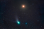 The infamous "Green" Comet C/2022 E3 (ZTF) passing by reddish Mars with both in the constellation of Taurus on the night of Feb 11,2023. The comet was 2° south of Mars this night. Mars was embedded in some of the dark obscuring dust clouds in Taurus,creating the dark patchy appearance to the background sky. The comet's coma glows cyan due to emission from diatomic carbon molecules,a common trait of comets. The dust tail and faint ion tail are just visible.