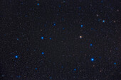 A framing of the northern spring constellation of Leo the Lion. Regulus is the blue star at lower right. Above and right of centre is the telescopic double star Algieba or Gamma Leonis.