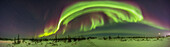 A 270° panorama of the Northern Lights and aurora curtains across the southern sky,on February 22,2023,from the grounds of the Churchill Northern Studies Centre,in Churchill,Manitoba. This was a Kp5 level aurora this night,active from twilight on and prominent here in the south at about 8:30 pm. Orion and the winter stars are embedded in the aurora at right of centre,above the old launch structures of the Churchill Rocket Range.