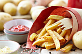 French fries with wooden fork