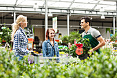 Garden centre salesmen and customers