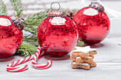 Christmas tree baubles with conifer branches