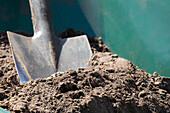 Wheelbarrow with shovel